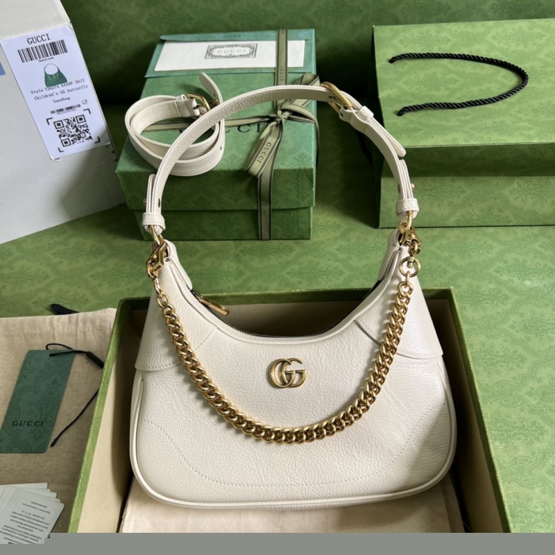 G*u*i top handle bags